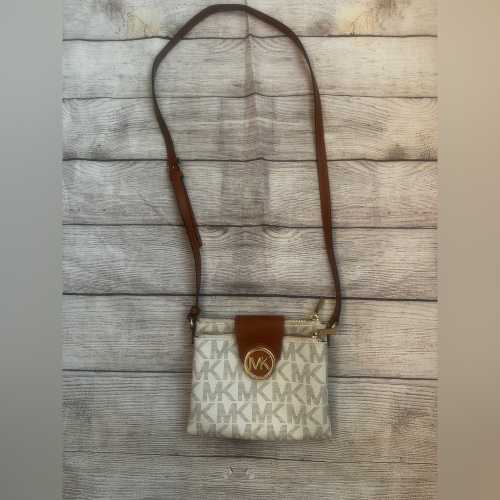 MK crossbody snap closure